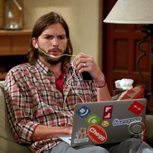Ashton on Two and a Half Men With Laptop
